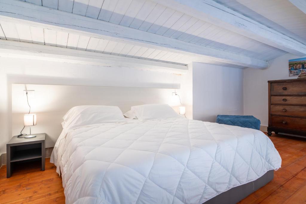 Postel nebo postele na pokoji v ubytování Borgo Vita Novella Resort