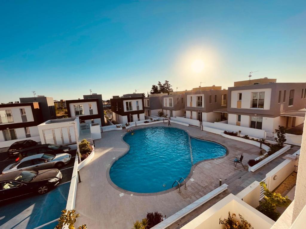 an overhead view of a swimming pool in a building at City Center Villa 7ms to Mall & Beach in Paphos