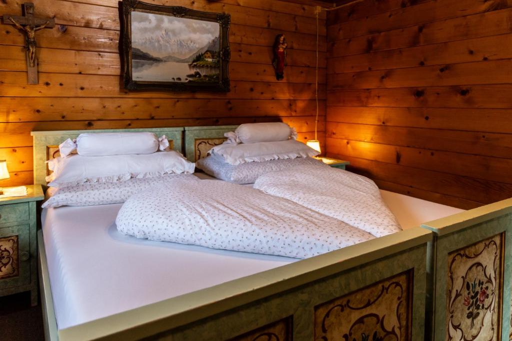 Postel nebo postele na pokoji v ubytování Ferienhütte Puutz