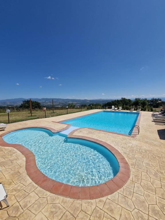 Bazén v ubytování Agriturismo Le Querce nebo v jeho okolí