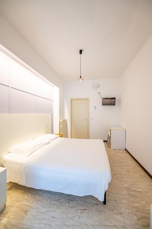 Postel nebo postele na pokoji v ubytování Hotel Altamira
