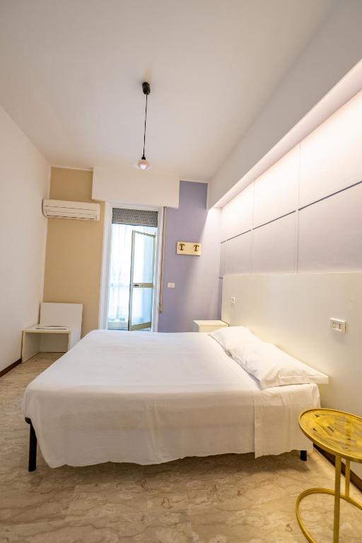 Postel nebo postele na pokoji v ubytování Hotel Altamira