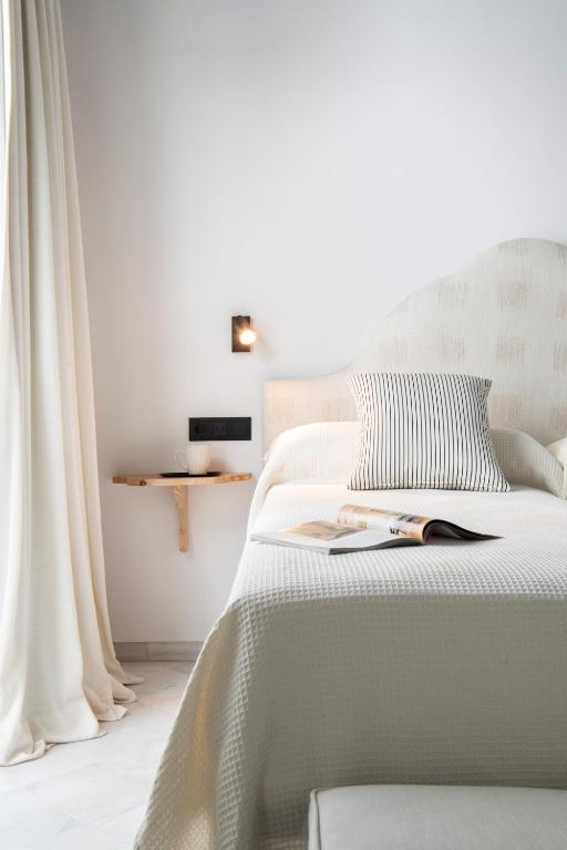 Posteľ alebo postele v izbe v ubytovaní Magno Apartments Fabiola Luxury House