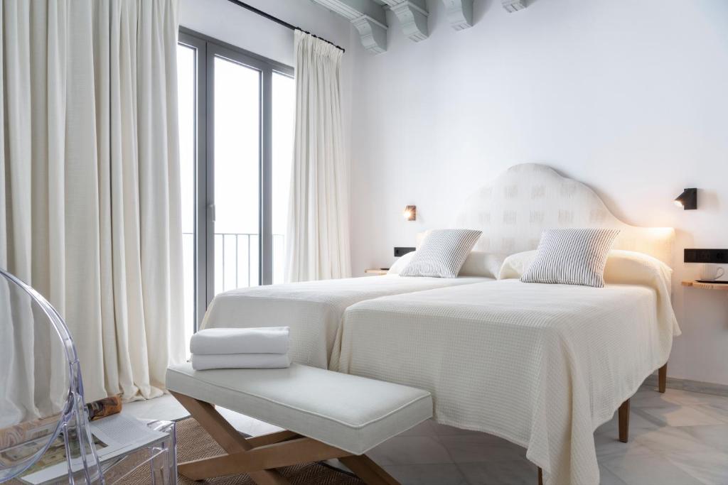 Posteľ alebo postele v izbe v ubytovaní Magno Apartments Fabiola Luxury House