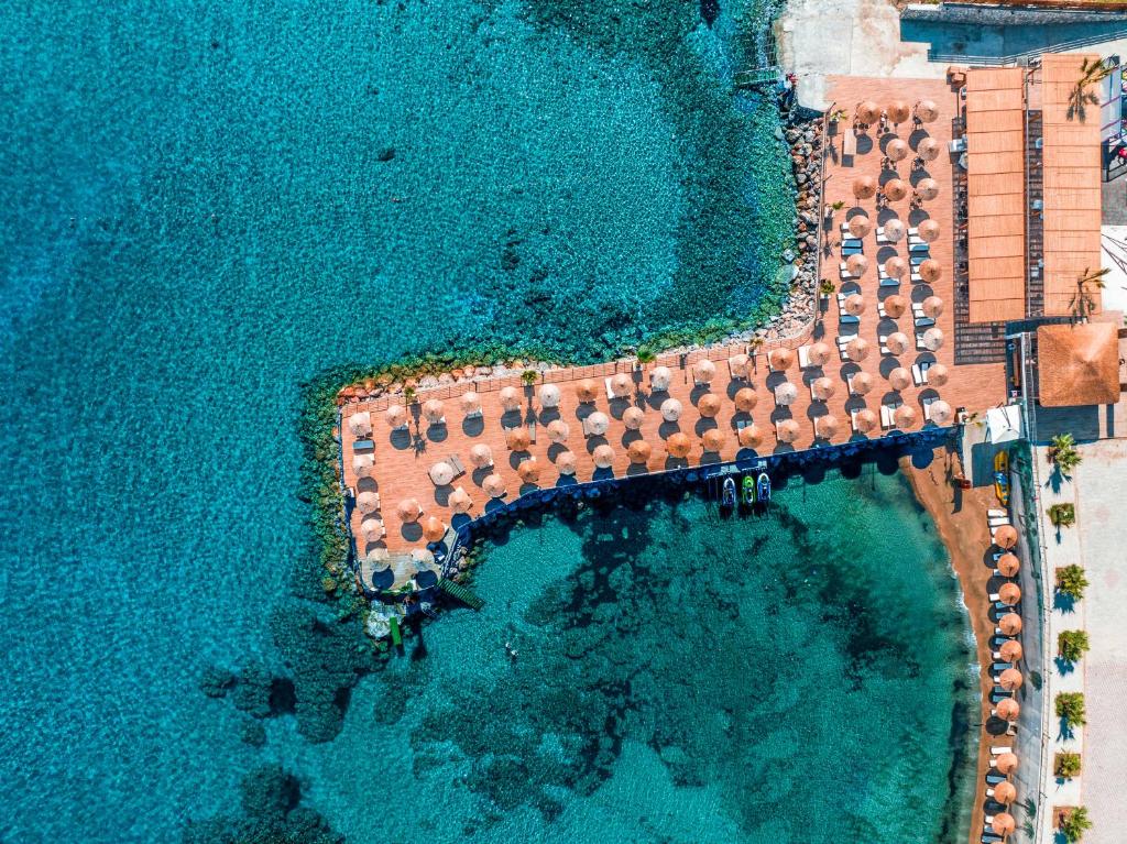 an aerial view of a resort on the water at Riverside Garden Resort in Kyrenia