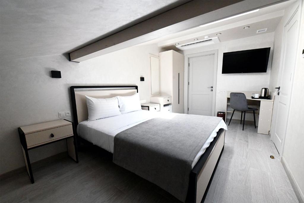 Postel nebo postele na pokoji v ubytování Prime Hotel