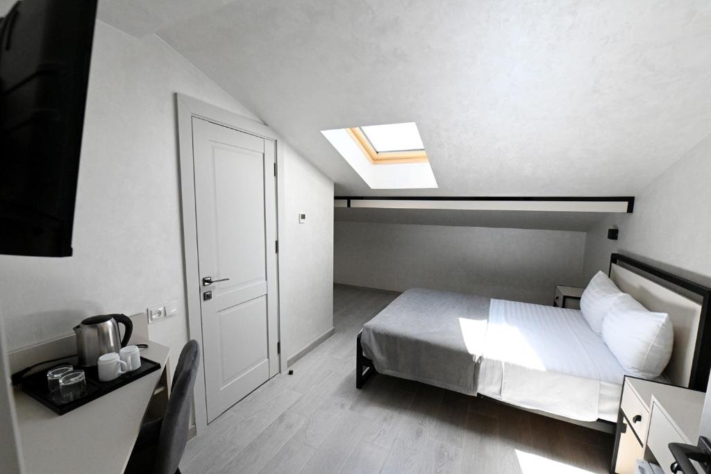 Postel nebo postele na pokoji v ubytování Prime Hotel