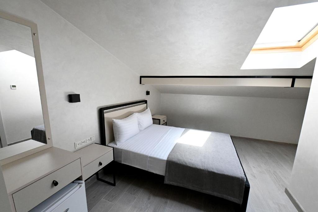 Postel nebo postele na pokoji v ubytování Prime Hotel