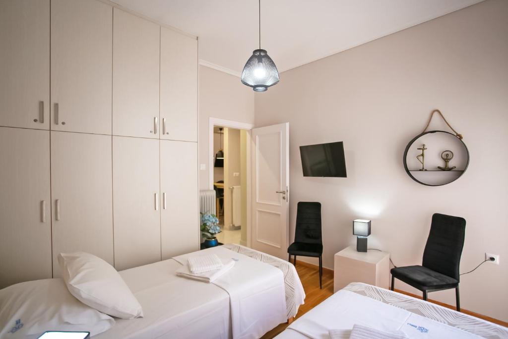 Posteľ alebo postele v izbe v ubytovaní Semeli by Heloni Apartments
