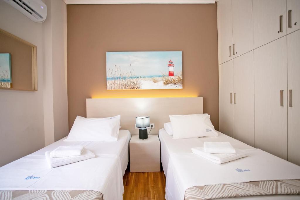 Posteľ alebo postele v izbe v ubytovaní Semeli by Heloni Apartments