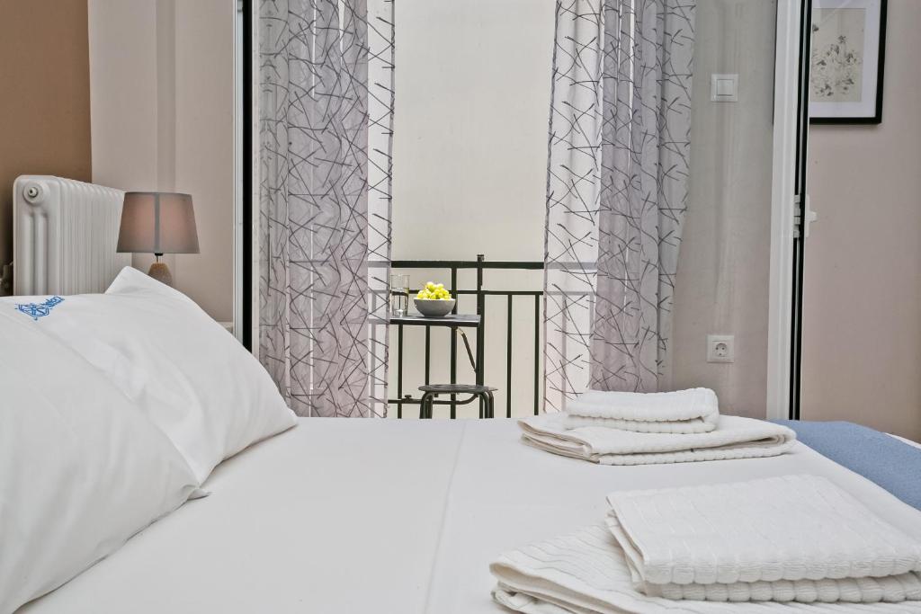 Posteľ alebo postele v izbe v ubytovaní Semeli by Heloni Apartments