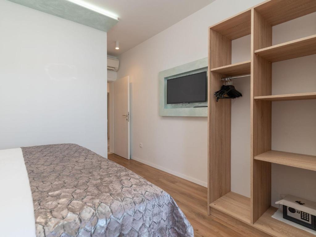 TV a/nebo společenská místnost v ubytování Apartment Mornar-3 by Interhome