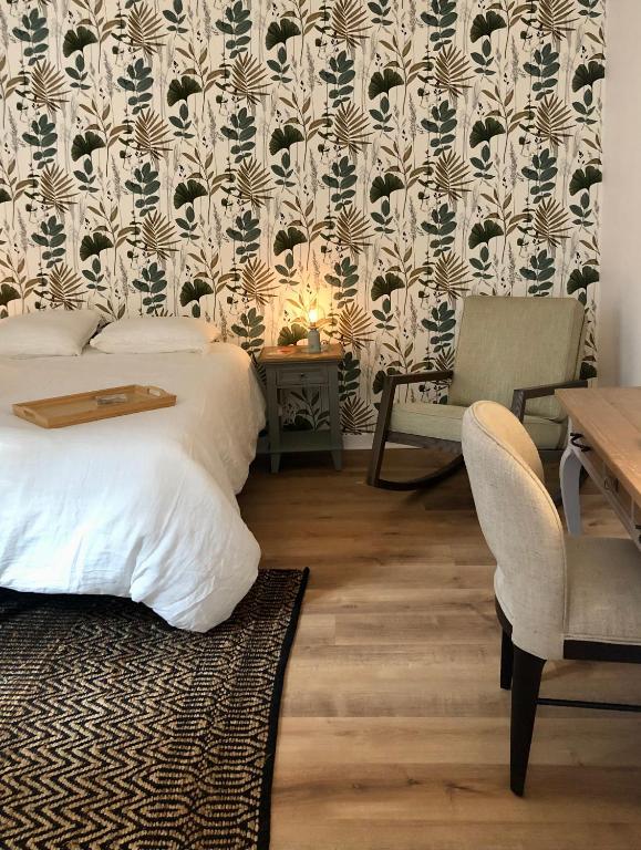 Postel nebo postele na pokoji v ubytování L’AMANTINE Chambres d’hôtes et gîte