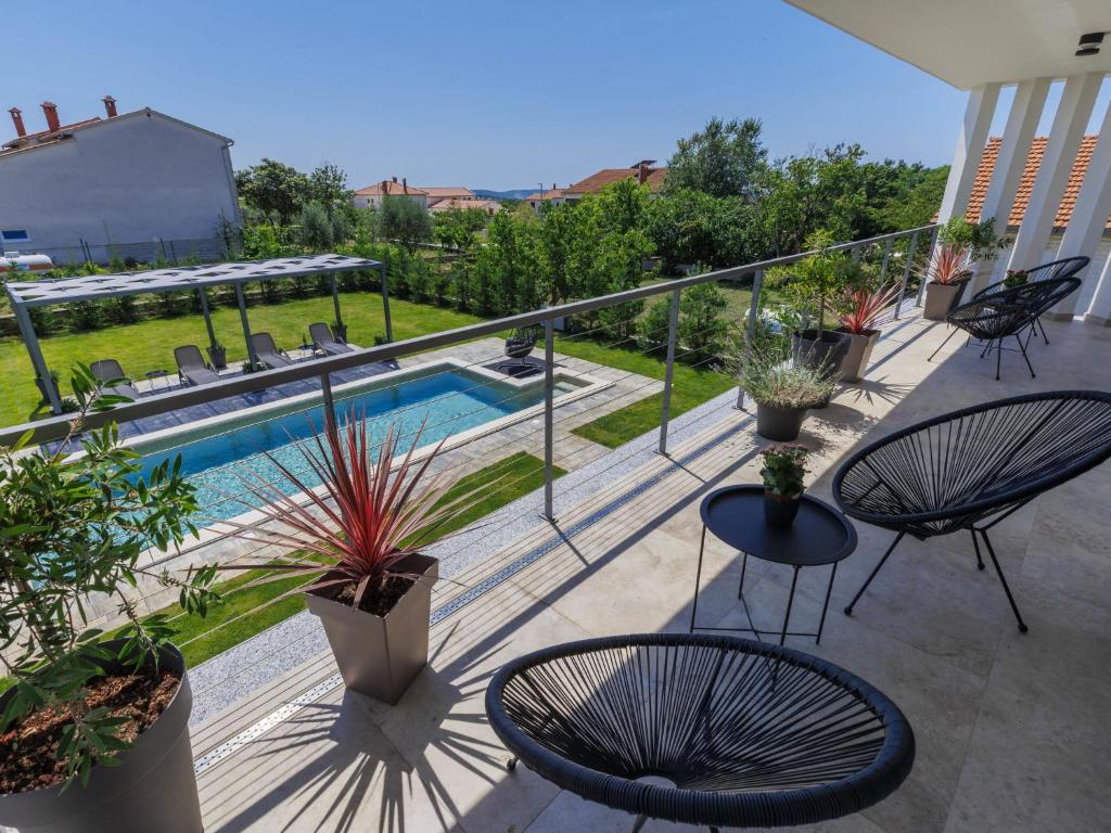Bazén v ubytovaní Holiday Home Villa Essea by Interhome alebo v jeho blízkosti