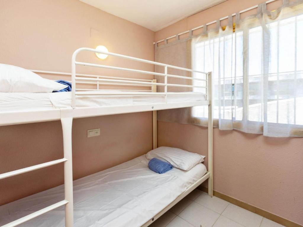 Postel nebo postele na pokoji v ubytování Apartment Catalunya by Interhome