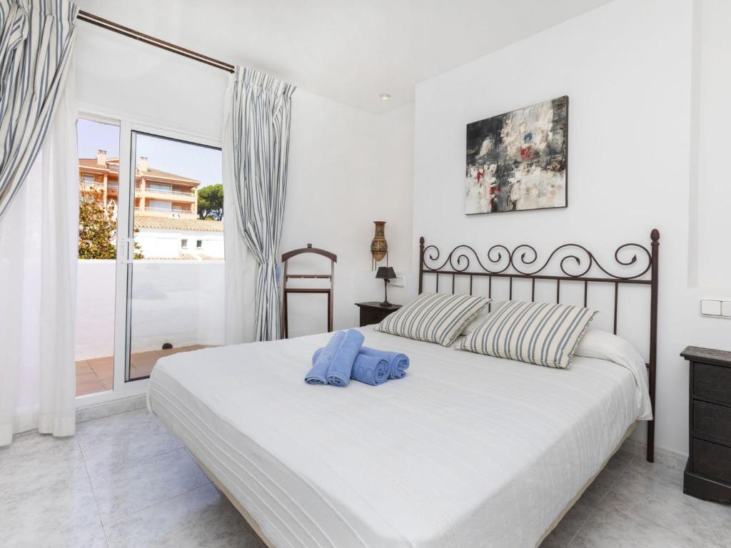 Posteľ alebo postele v izbe v ubytovaní Holiday Home Reserva V by Interhome