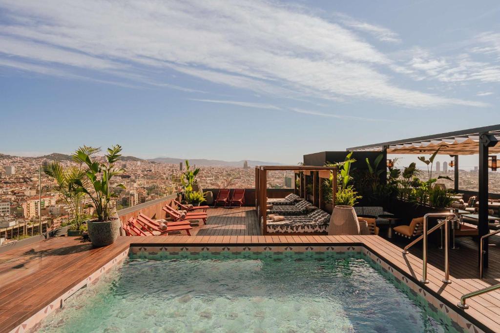 a swimming pool on the roof of a house at Nobu Hotel Barcelona in Barcelona