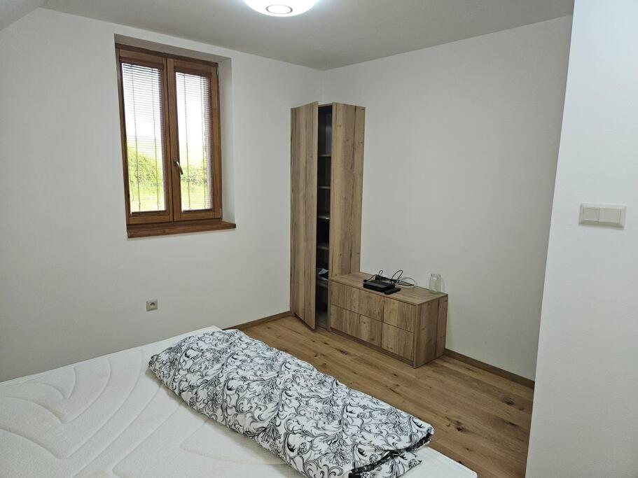 Postel nebo postele na pokoji v ubytování Vinársky dom u kríža