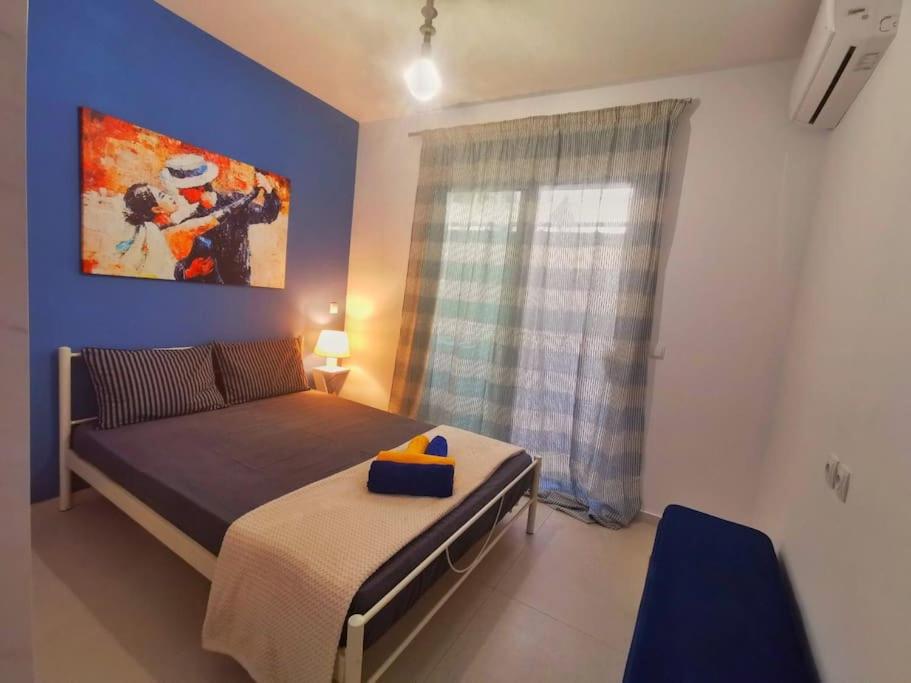 Postel nebo postele na pokoji v ubytování Perseas House