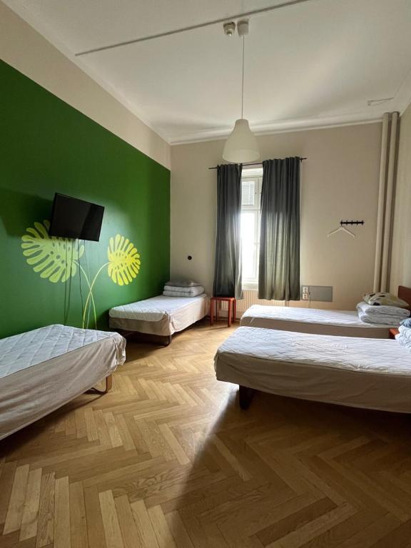 Postel nebo postele na pokoji v ubytování Carlstad Sport Hostel
