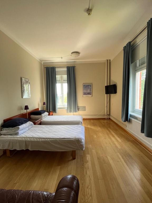 Postel nebo postele na pokoji v ubytování Carlstad Sport Hostel