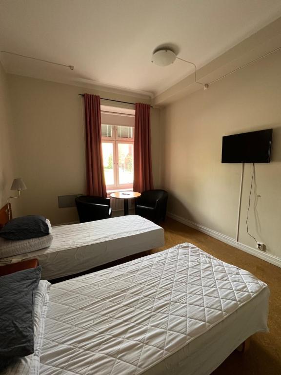 Postel nebo postele na pokoji v ubytování Carlstad Sport Hostel