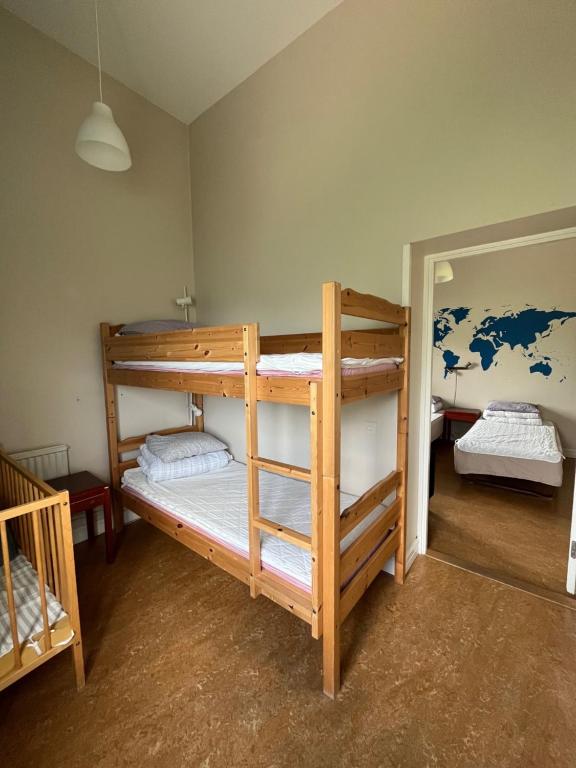 Postel nebo postele na pokoji v ubytování Carlstad Sport Hostel