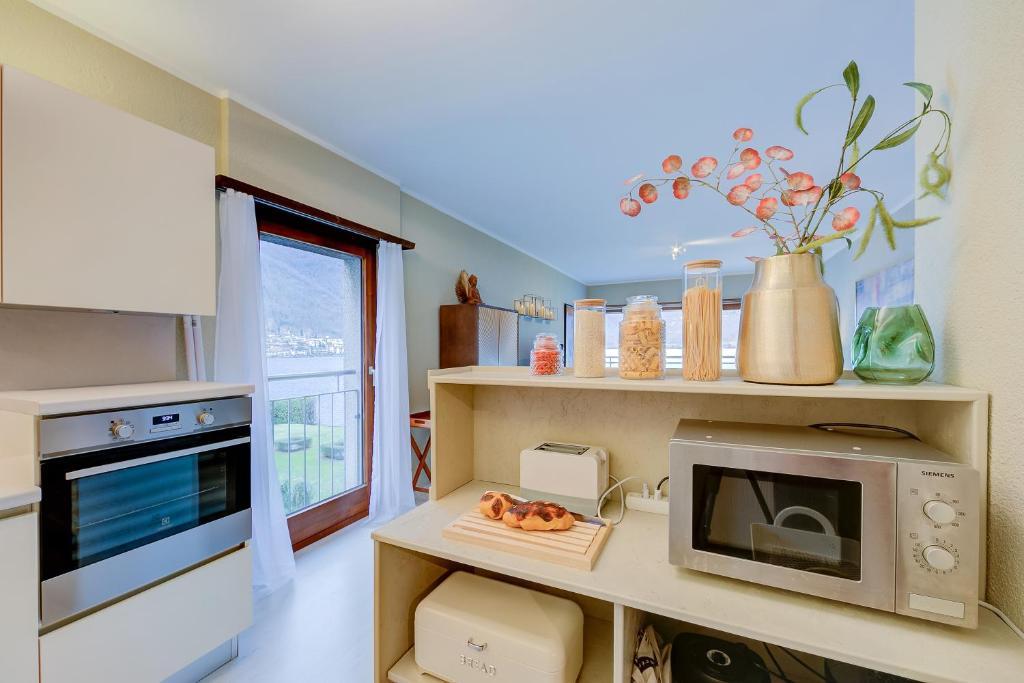Kuchyň nebo kuchyňský kout v ubytování Emotion Lake View - Happy Rentals