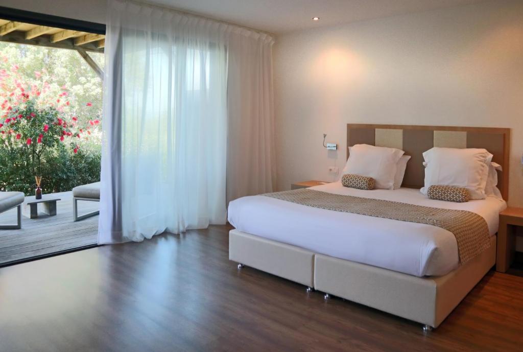 Postel nebo postele na pokoji v ubytování Hotel Restaurant Mariosa