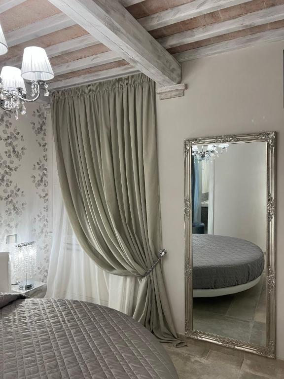 Postel nebo postele na pokoji v ubytování L’ Aia del Principe