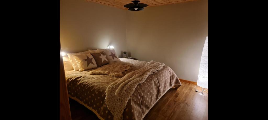 Posteľ alebo postele v izbe v ubytovaní Ekhems Gård