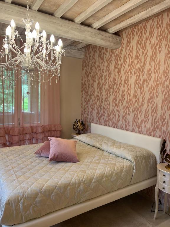 Postel nebo postele na pokoji v ubytování L’ Aia del Principe