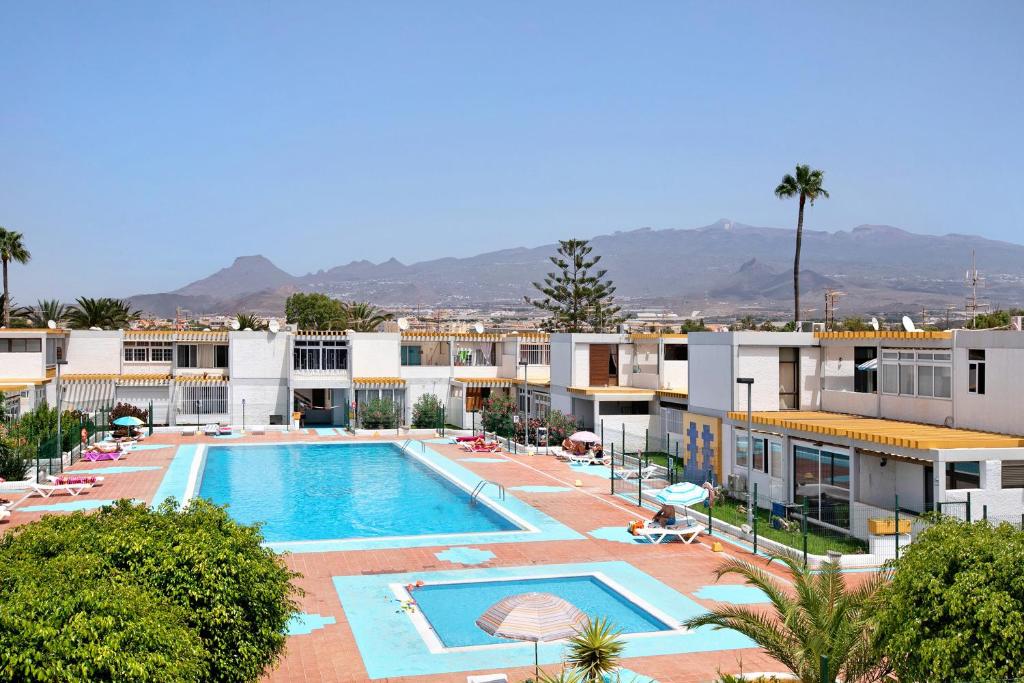 arial view of a resort with a swimming pool at El Drago in Costa Del Silencio
