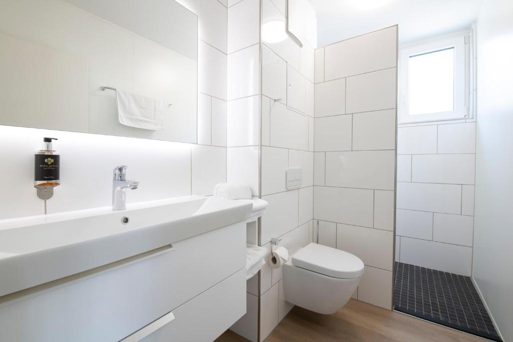 Koupelna v ubytování Smart & Stay Aparthotel Saarlouis Lisdorf - Self-Check-In - Free Parking