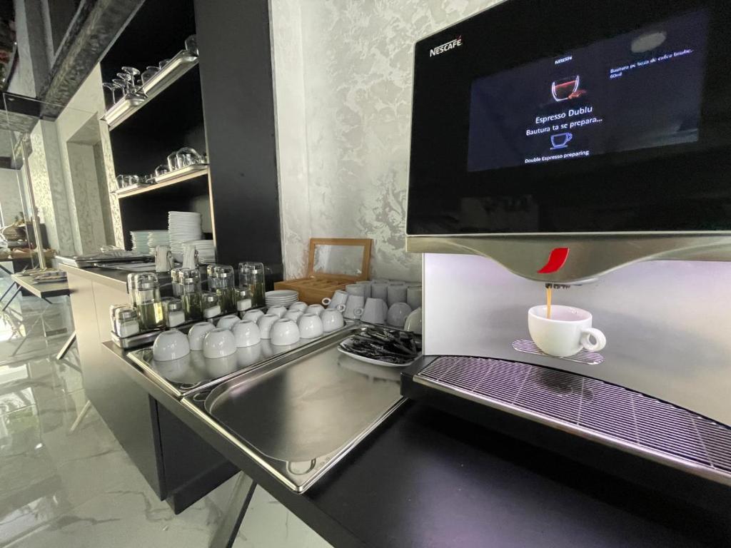 Kuchyň nebo kuchyňský kout v ubytování HOTEL KALYA