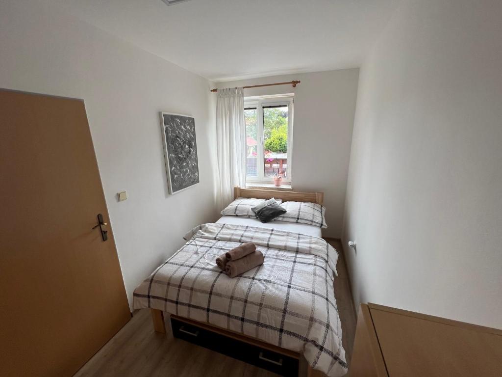 Postel nebo postele na pokoji v ubytování Ubytování u Novotných