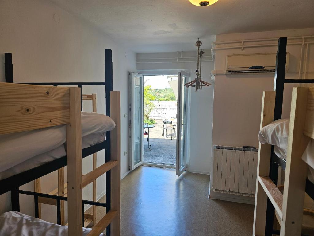 Postel nebo postele na pokoji v ubytování Guesthouse SOLE