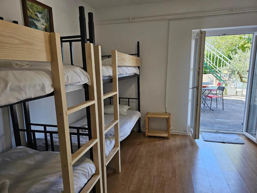 Postel nebo postele na pokoji v ubytování Guesthouse SOLE