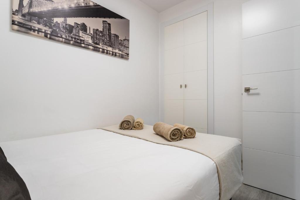 Posteľ alebo postele v izbe v ubytovaní Sur Suites Principe