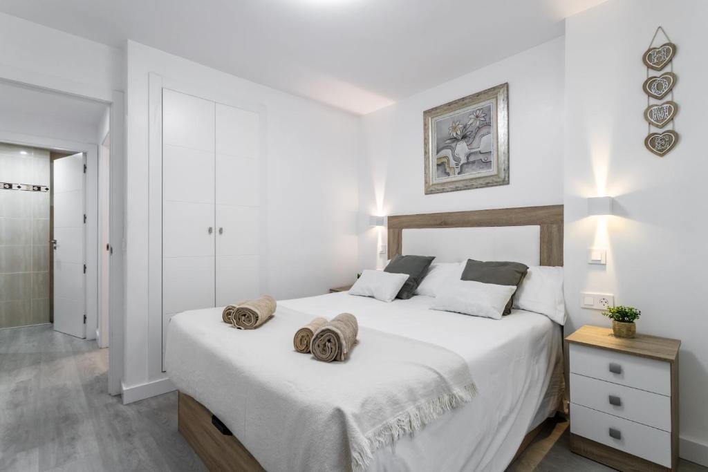 Posteľ alebo postele v izbe v ubytovaní Sur Suites Principe