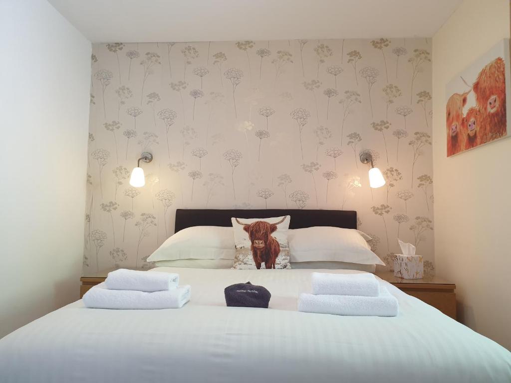 Postel nebo postele na pokoji v ubytování Carnaburg Guesthouse