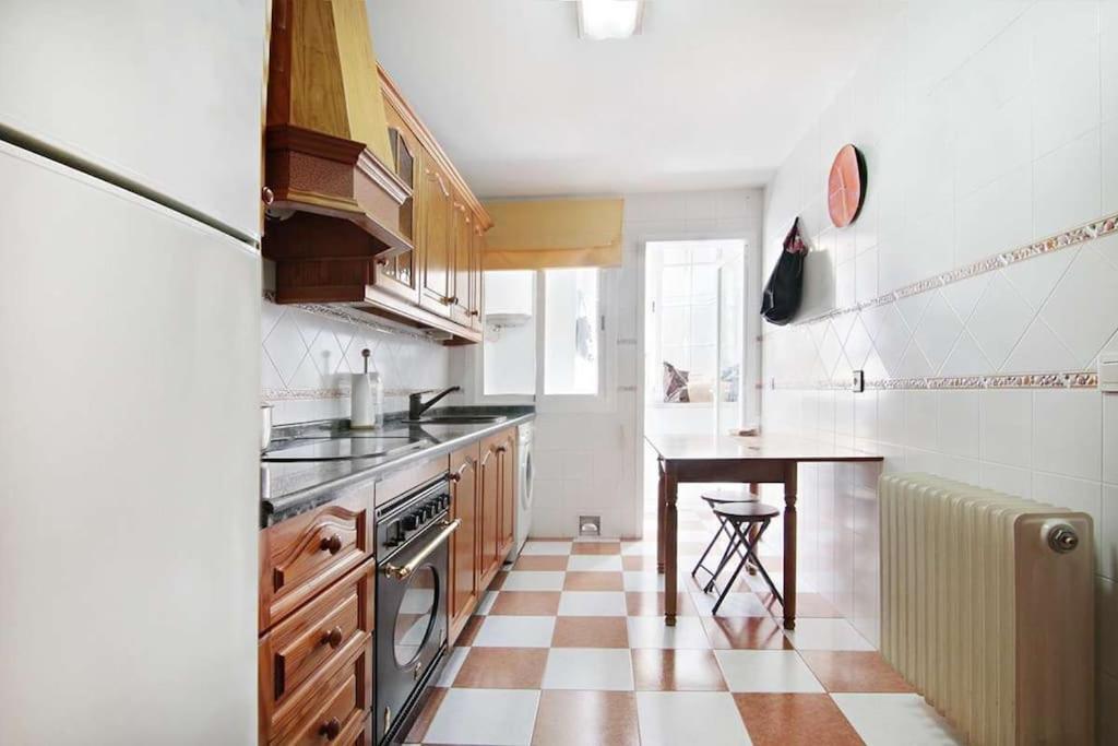 A kitchen or kitchenette at Apartamento cátedra