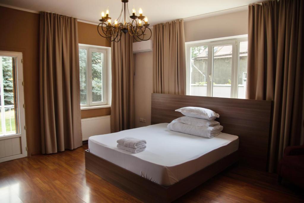 Postel nebo postele na pokoji v ubytování People Guest House