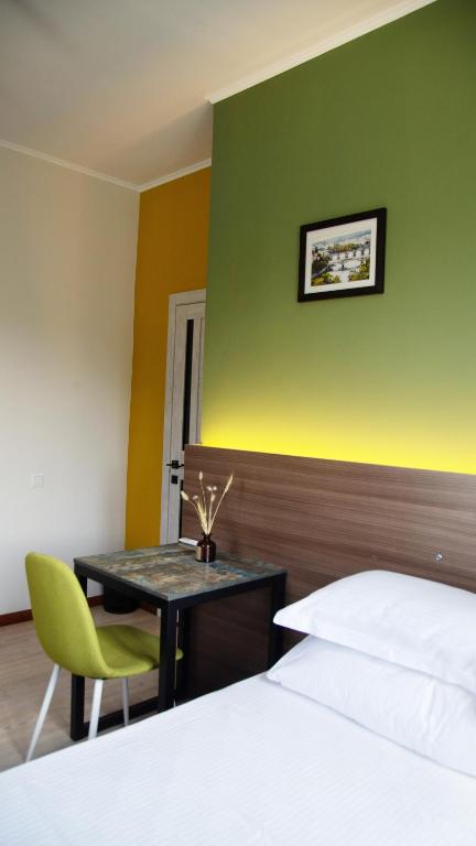 Postel nebo postele na pokoji v ubytování People Guest House