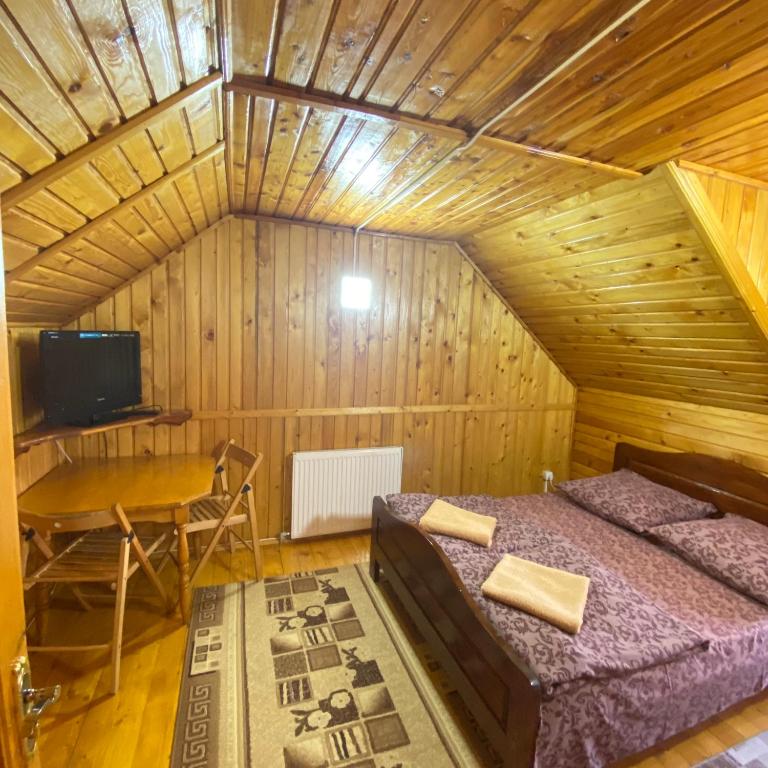 TV a/nebo společenská místnost v ubytování Pid Playem