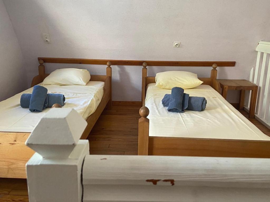 Postel nebo postele na pokoji v ubytování Hôtel des Bateliers