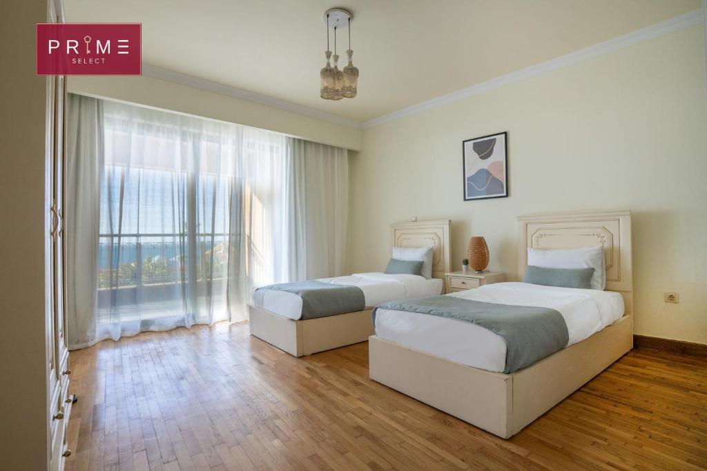 Postel nebo postele na pokoji v ubytování Prime Select San Stefano Alexandria