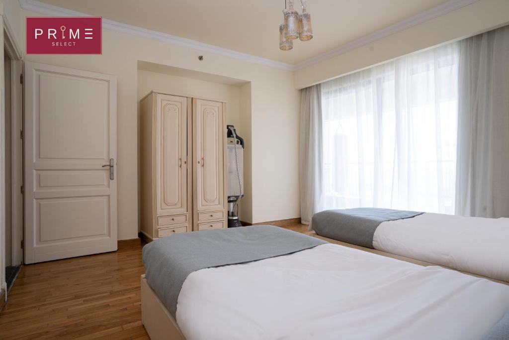 Postel nebo postele na pokoji v ubytování Prime Select San Stefano Alexandria