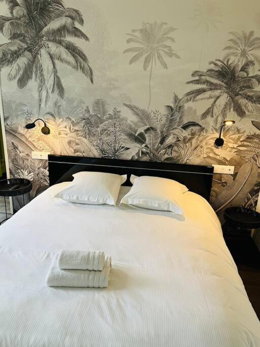 Una cama o camas en una habitaci&oacute;n de Escapade &agrave; Boulogne sur mer