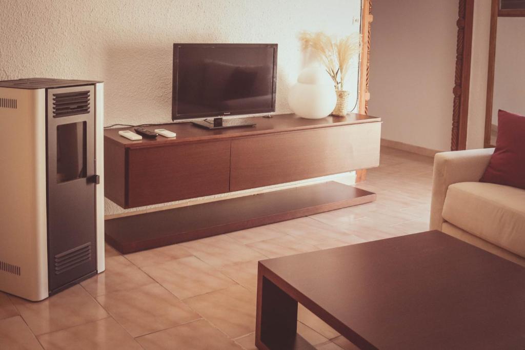 TV a/nebo společenská místnost v ubytování Ca la Tendeta